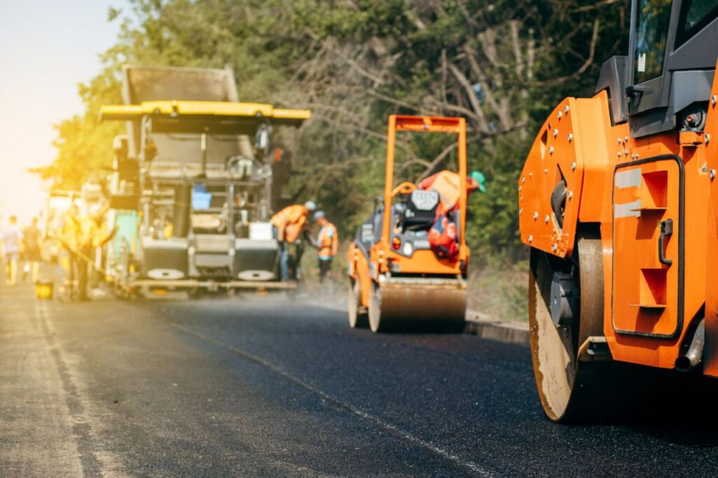 vibratory-asphalt-rollers-compactor-compacting-new-asphalt-pavement-road-service-build-new-highwa