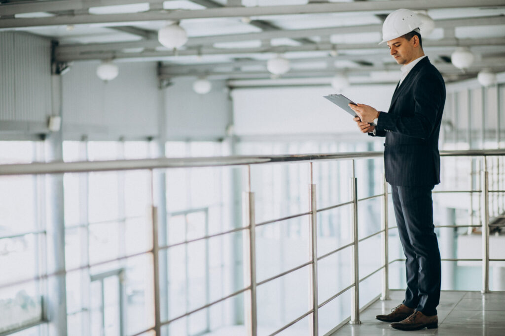 business-man-engineer-hard-hat-building