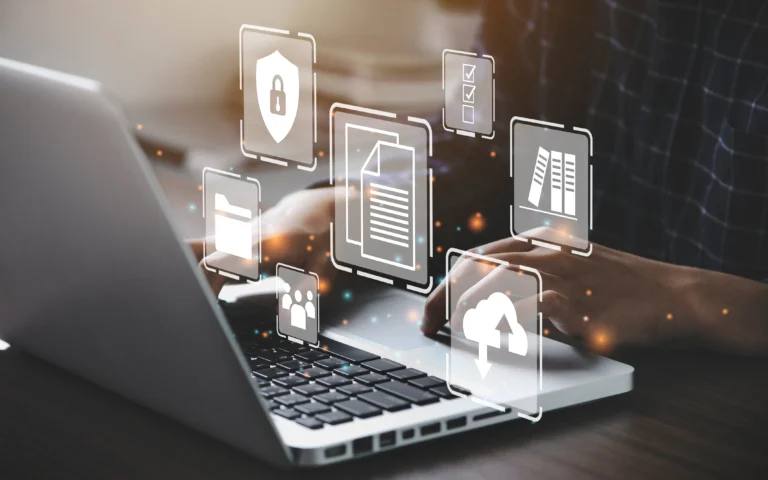 Person typing on a laptop with floating digital icons representing cloud storage, document security, file sharing, and data access.