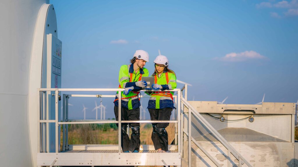 mechanical engineers going over blueprint drawing for a public works project