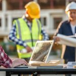 City planners discuss a public works project in progress