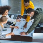 Collaborative team planning in modern office space