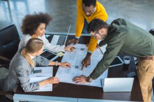 Collaborative team planning in modern office space